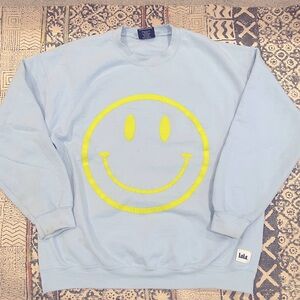 The World Needs Your Magic Puff Print Pullover in Sky Blue